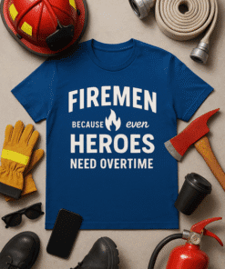 Fireman t-shirt with hero quote and firefighter gear displayed on flat lay.