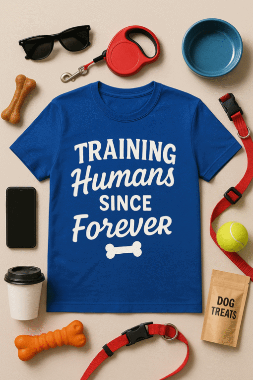 Training Humans T-shirt for dog lovers, funny pet owner gift, casual wear for animal enthusiasts.