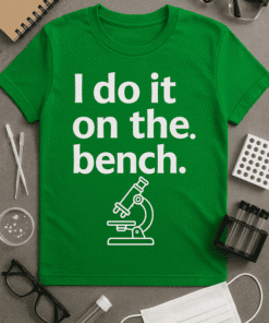 Microscope-themed green T-shirt with humorous science quote for lab and science enthusiasts.
