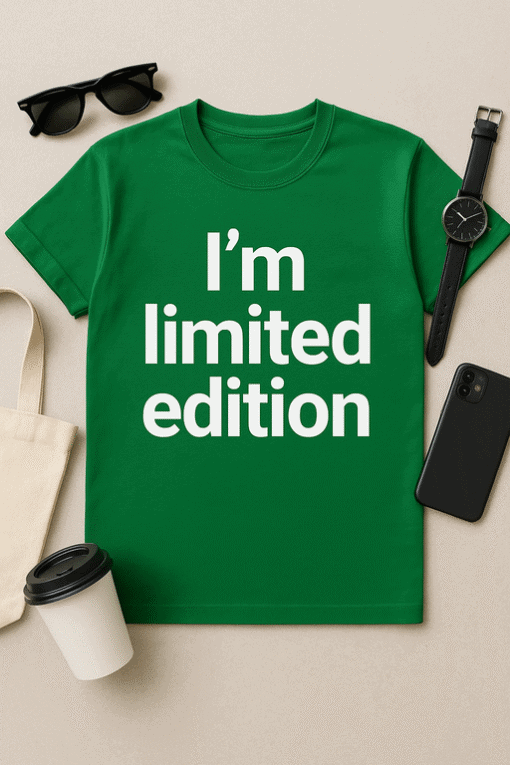 Limited edition t-shirt with bold text, casual accessories, and tech gadgets for trendy style.