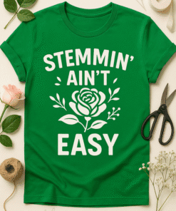 Comfortable green T-shirt with "Stemming Ain't Easy" slogan and floral design, perfect for casual wear and gardening enthusiasts.