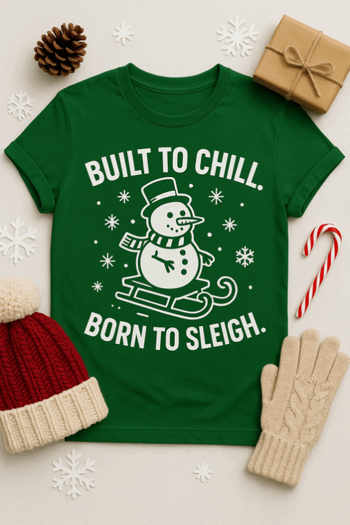 1. Festive green T-shirt with snowman and holiday slogan, perfect for Christmas.