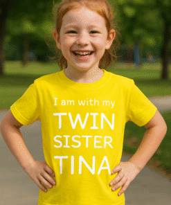 Cute kids' T-shirt with playful twin sister quote, ideal for sibling matching outfits.