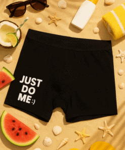 1. Black men's boxer briefs with "Just Do Me" slogan and smiley face, beach-themed accessories for summer style.