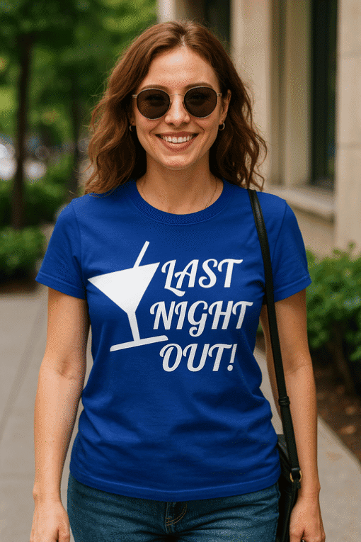 Relaxed-fit blue T-shirt with "Last Night Out" slogan and cocktail graphic for fun, casual style.