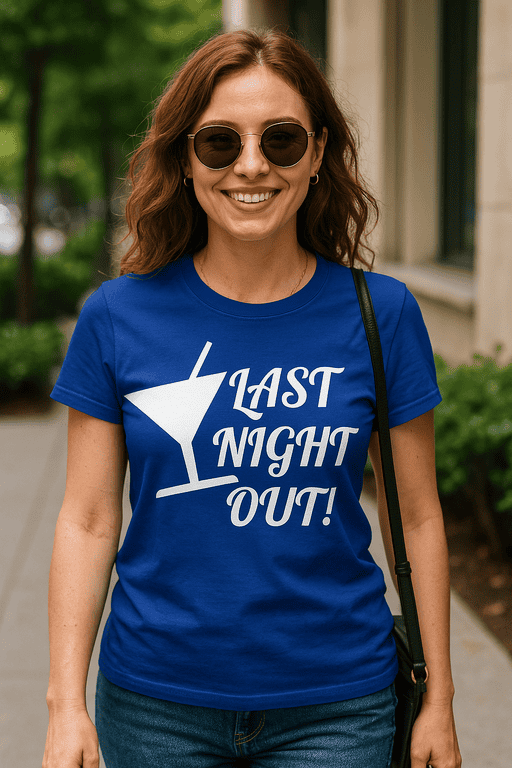 Relaxed-fit blue T-shirt with "Last Night Out" slogan and cocktail graphic for fun, casual style.