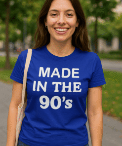 Bright blue vintage-inspired T-shirt with "Made in the 90's" slogan, perfect for retro fashion lovers.