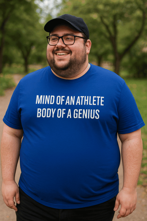 - Enthusiastic man wearing a blue T-shirt with motivational quote outdoors.