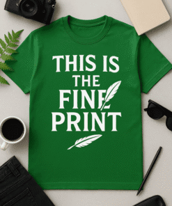Bright green t-shirt with "This is the fine print" quote and feather graphics for stylish casual wear.