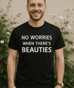Happy man wearing black T-shirt with inspirational quote outdoors.