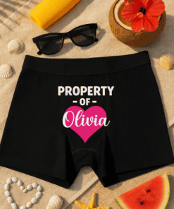 1. Custom embroidered property of Olivia shorts for personalized summer style.