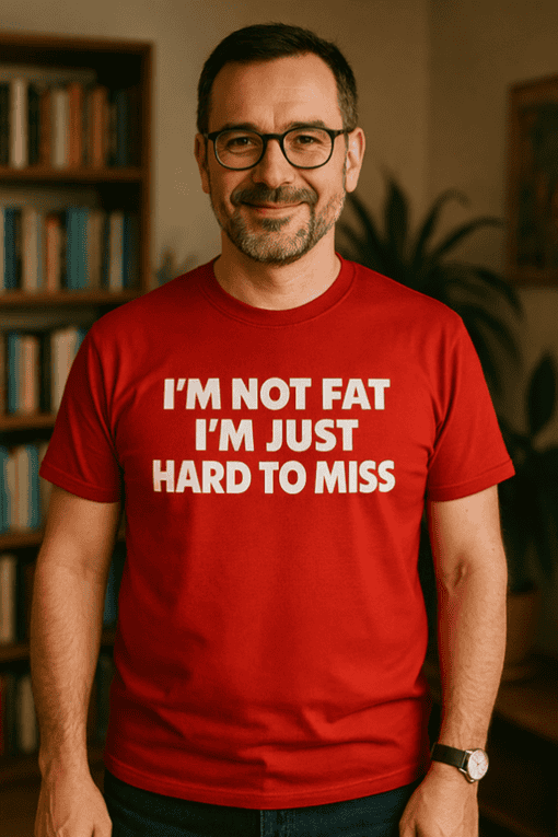 Comfortable red T-shirt with humorous "I'm not fat, I'm just hard to miss" slogan for casual wear and fun fashion statements.