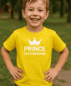 Happy boy wearing custom prince T-shirt, perfect for boys' personalized clothing.