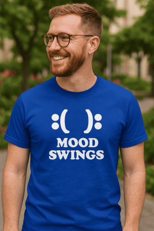 Happy face emoji with text mood swings on blue T-shirt, casual wear for men and women, humorous mood-themed clothing, T-shirtplease.com.