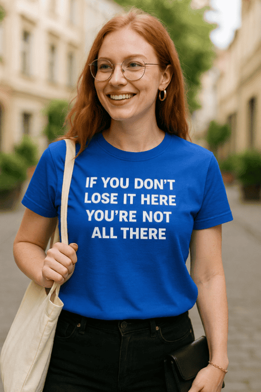 Bright blue graphic T-shirt with motivational quote, casual streetwear style.
