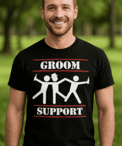 Smiling man wearing a humorous "Groom Support" T-shirt for bachelor party fun.