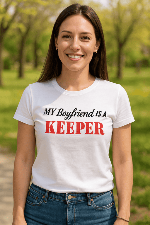 Happy girlfriend with a fun white T-shirt that reads "MY Boyfriend IS A KEEPER" in black and red text.