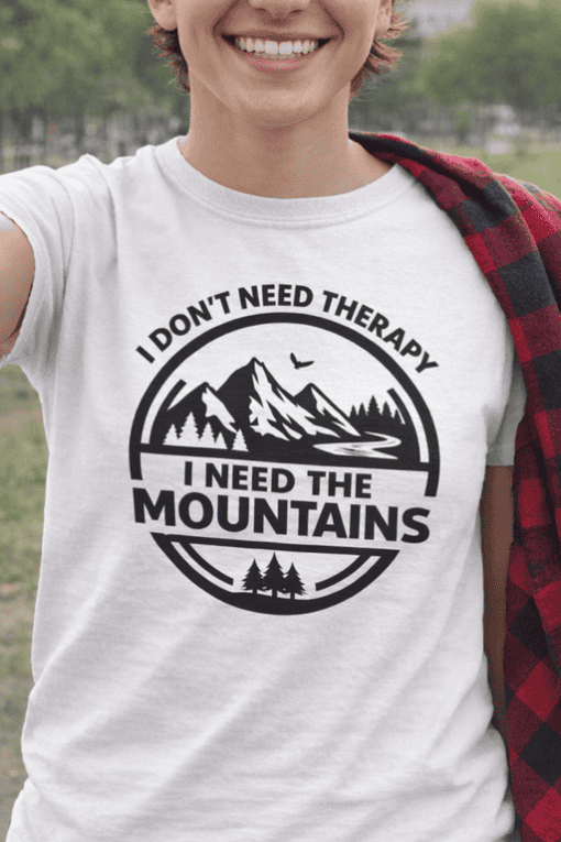 Mountain-themed inspirational t-shirt for outdoor lovers and hikers. Perfect for nature enthusiasts.