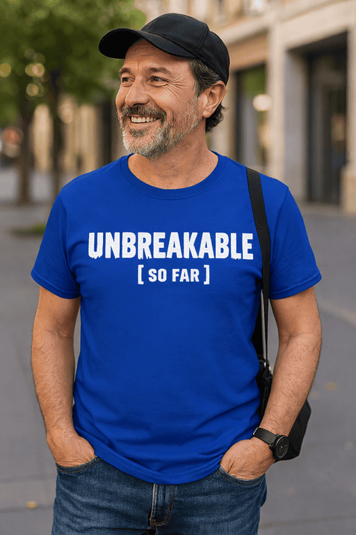 Unbreakable T-shirt, funny men's graphic tee, durable strength quote, casual streetwear, trendy summer outfit.