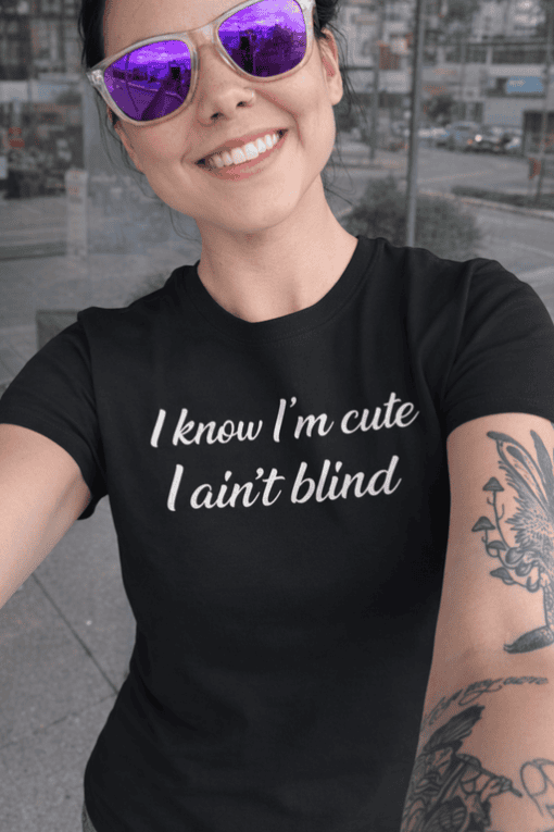 1. Cute black T-shirt with funny quote "I know I’m cute I ain’t blind".