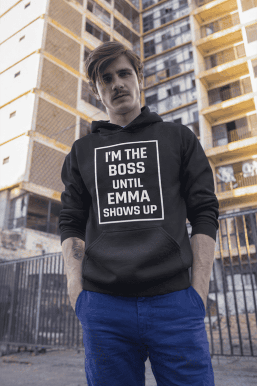 Bold black hoodie with humorous "I'm the boss until Emma shows up" print, perfect for casual streetwear.