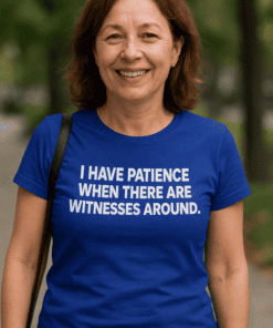 1. Woman wearing blue humorous 'I have patience' T-shirt in outdoor park setting.