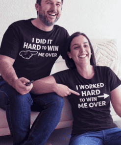 1. Funny couple wearing matching motivational T-shirts about success and perseverance.