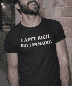 - Playful humorous men's T-shirt with witty text for casual fashion.
