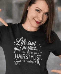 Stylish black T-shirt with humorous hairstylist quote, perfect for salon workers and hair enthusiasts.