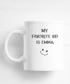 Cute kids' mug with "My favorite kid is Emma" and a smiley face design, perfect for personalized gifts.