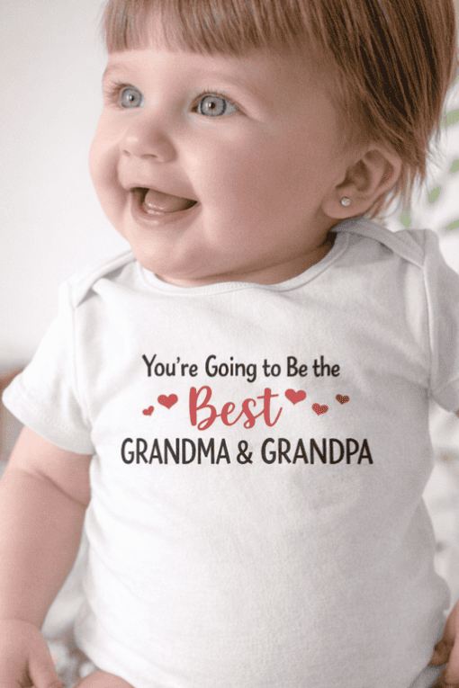 Adorable baby wearing personalized "Best Grandma & Grandpa" T-shirt, perfect gift for grandparents.