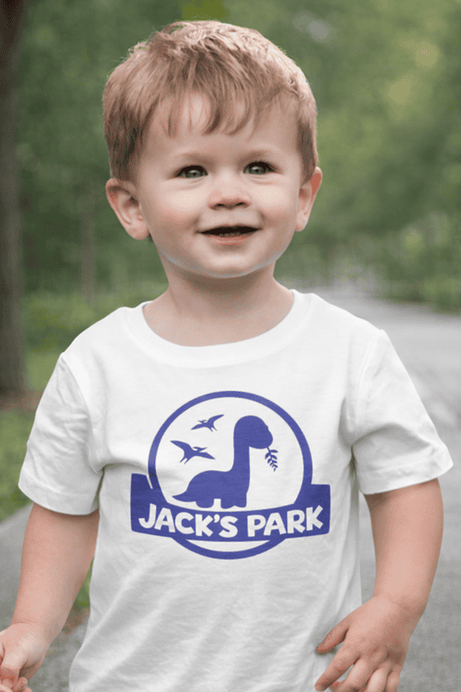 Cute dinosaur t-shirt for kids, Jack's Park design, perfect for children’s casual wear and outdoor adventures.