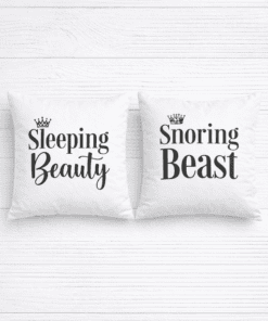 Comfortable sleep pillows with funny "Sleeping Beauty" and "Snoring Beast" quotes, perfect for bedroom decor.
