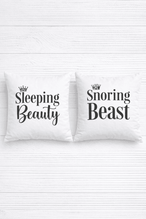 Comfortable sleep pillows with funny "Sleeping Beauty" and "Snoring Beast" quotes, perfect for bedroom decor.