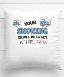 Zzzz sleeping graphic, funny pillow with "Your Snoring Drives Me Crazy" quote for couples.