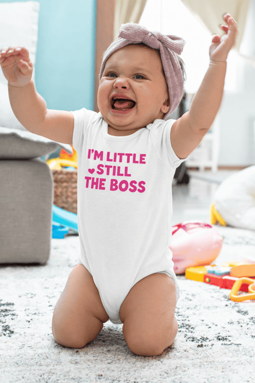 1. Baby onesie with "I'm little, still the boss" text, newborn clothing, cute toddler apparel.