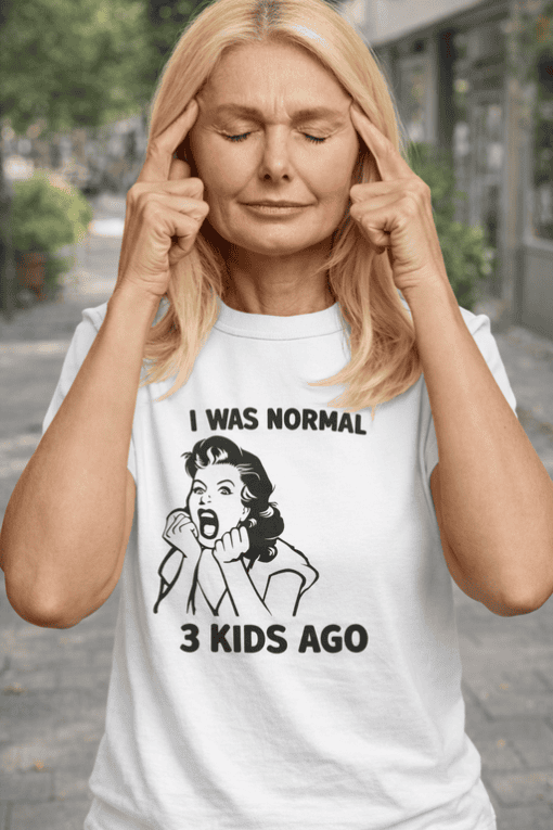 Frustrated woman wearing humorous T-shirt with funny quote about kids, casual street style, modern graphic tee.