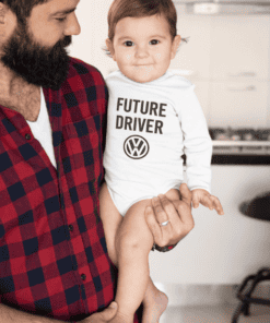 Cute baby wearing "Future Driver" VW T-shirt, family moments, stylish children's fashion.