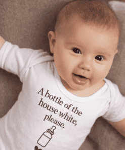 Baby T-shirt with humorous phrase and baby bottle graphic, perfect for cute, funny baby clothing.