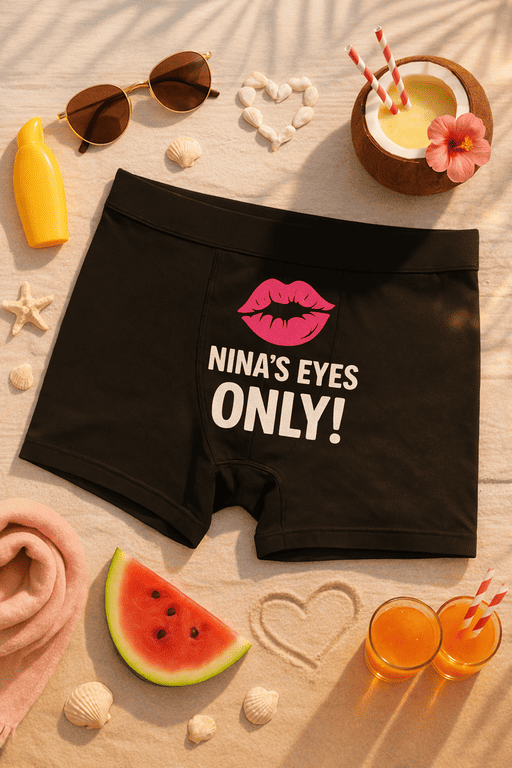 Pink lips and "Nina's Eyes Only!" slogan on black women's underwear for fun, playful fashion style.