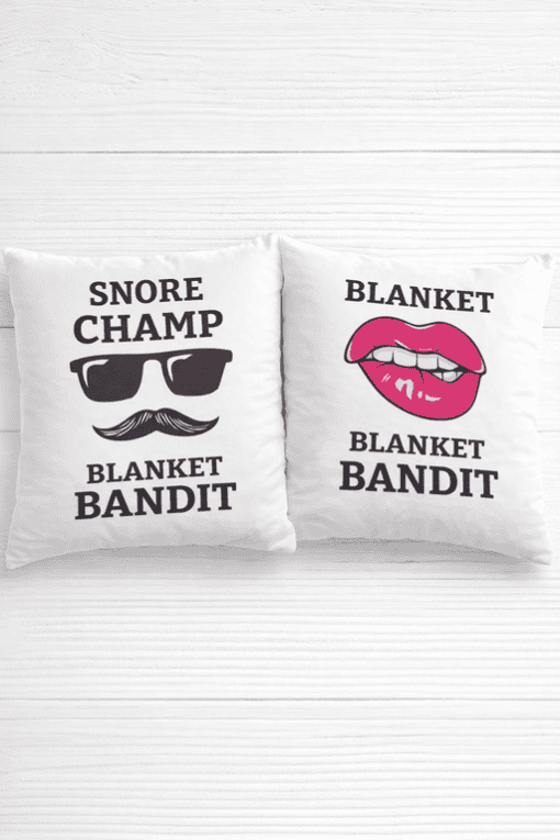 Snore champ and blanket bandit pillow set with humorous sleep-related designs.