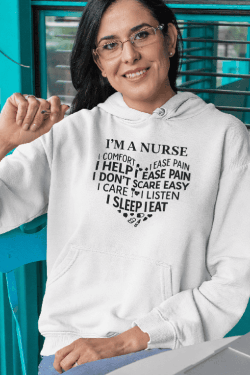 Comfortable nurse hoodie with printed text about helping, easing pain, and listening, ideal for healthcare professionals.