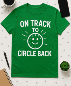 Smile face green T-shirt with motivational quote on track to circle back.