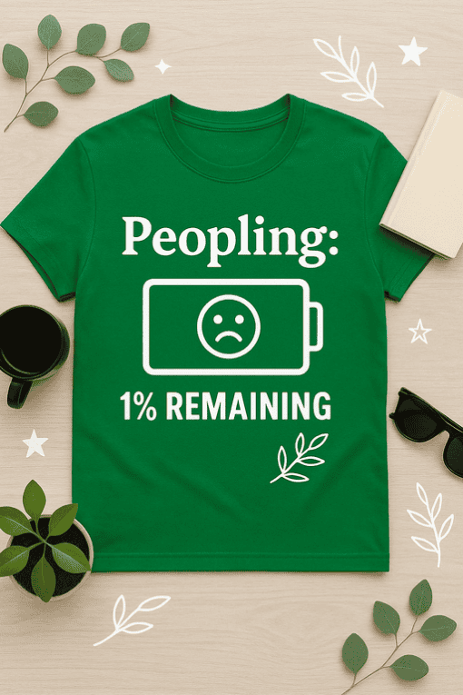 Low battery humor t-shirt for tech lovers, funny graphic tee with sad battery icon, perfect for casual wear.