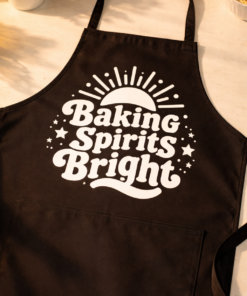 Funny apron with the slogan Baking Spirits Bright